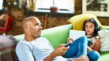 father-daughter-watching-tv