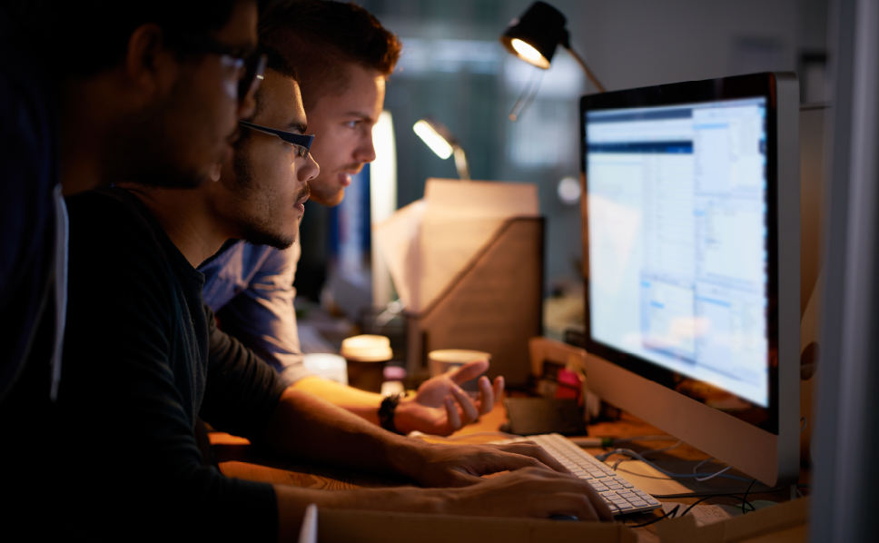 A group of marketers studying viewer data pulled via Nielsen's streaming measurement solution.